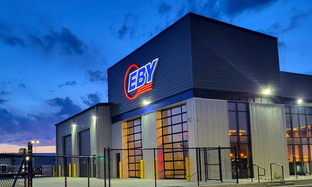 3D dimensional letters with brushed metal finish mounted on a commercial building façade, custom fabricated and installed by Sign Pro